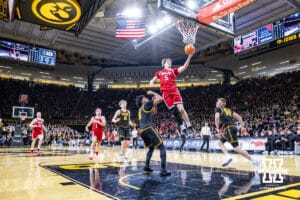 Nebraska Cornhusker forward Braden Frager (5) makes a lay up against the Iowa Hawkeyes in the first half during a college basketball game on Tuesday, Feb. 17, 2026, in Iowa City, Iowa. Photo by John S. Peterson.