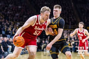 Nebraska Cornhusker forward Rienk Mast (51) drives to the basket against Iowa Hawkeye guard Bennett Stirtz (14) in the first half during a college basketball game on Tuesday, Feb. 17, 2026, in Iowa City, Iowa. Photo by John S. Peterson.