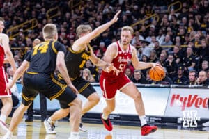 Nebraska Cornhusker forward Rienk Mast (51) dribbles the ball against Iowa Hawkeye forward Cooper Koch (8) in the first half during a college basketball game on Tuesday, Feb. 17, 2026, in Iowa City, Iowa. Photo by John S. Peterson.