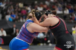 Palmyras Evelyn Bryan-Aldrich wraps up Adams Centrals Quinlyn Statz during Nebraska Girls Wrestling Quarterfinals on Feb 17, 2026, in Omaha, Nebraska. Photo by Brandon Tiedemann