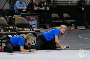 Palmyras coaches laydown during Nebraska Girls Wrestling Quarterfinals on Feb 17, 2026, in Omaha, Nebraska. Photo by Brandon Tiedemann