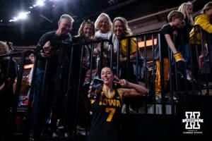 Iowa Hawkeye guard Addison Deal (7) takes a selfie for the fans at the game against the Nebraska Cornhuskers during a college basketball game on Monday, Feb. 16, 2026, in Lincoln, Nebraska. Photo by John S. Peterson.