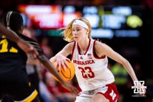 Nebraska Cornhusker guard Britt Prince (23) dribbles the balll against Iowa Hawkeye guard Chazadi Wright (11) during a college basketball game on Monday, Feb. 16, 2026, in Lincoln, Nebraska. Photo by John S. Peterson.