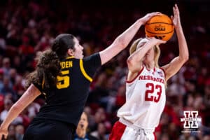 Iowa Hawkeye center Ava Heiden (5) blocks Nebraska Cornhusker guard Britt Prince (23) during a college basketball game on Monday, Feb. 16, 2026, in Lincoln, Nebraska. Photo by John S. Peterson.
