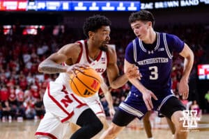 Nebraska Cornhusker guard Jamarques Lawrence (10) dribbles the ball against Northwestern Wildcat guard Jake West (3) in the second half during a college basketball game on Saturday, Feb. 14, 2026, in Lincoln, Nebraska. Photo by John S. Peterson.