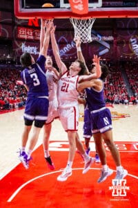 Nebraska Cornhusker forward Pryce Sandfort (21) goes for a rebound against the Northwestern Wildcats in the first half during a college basketball game on Saturday, Feb. 14, 2026, in Lincoln, Nebraska. Photo by John S. Peterson.