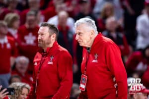 Former Nebraska Cornhuskers Tommy Wald and head coach Danny Nee walk on to the court to be recognized at a break in the action against the Northwestern Wildcats during a college basketball game on Saturday, Feb. 14, 2026, in Lincoln, Nebraska. Photo by John S. Peterson.