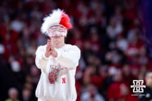 Nebraska Cornhusker student plays a game at a break in the action against the Northwestern Wildcats during a college basketball game on Saturday, Feb. 14, 2026, in Lincoln, Nebraska. Photo by John S. Peterson.