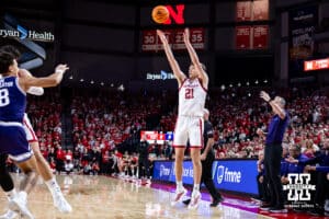 Nebraska Cornhusker forward Pryce Sandfort (21) makes a three point basket against the Northwestern Wildcats in the first first half during a college basketball game on Saturday, Feb. 14, 2026, in Lincoln, Nebraska. Photo by John S. Peterson.