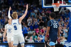 Creighton Bluejay Ty Davis (9) hypes up the crowd during a college basketball game against Villanova on Feb 14, 2026, in Omaha, Nebraska. Photo by Brandon Tiedemann