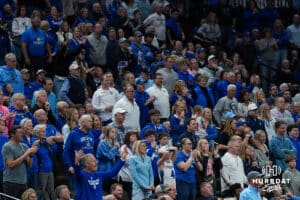 Creighton Bluejay fans stand upset during a college basketball game against Villanova on Feb 14, 2026, in Omaha, Nebraska. Photo by Brandon Tiedemann