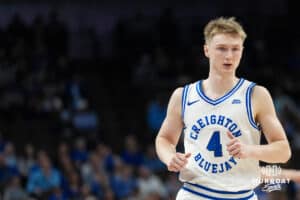 Creighton Bluejay Josh Dix (4) runs down court during a college basketball game against Villanova on Feb 14, 2026, in Omaha, Nebraska. Photo by Brandon Tiedemann