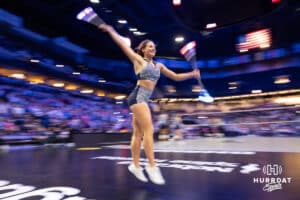 Omaha Supernovas Hype Squad member twirls a couple of batons in a break in the action against the Dallas Pulse during a professional volleyball match on Thursday, Feb. 12, 2026, in Omaha, Nebraska. Photo by John S. Peterson.