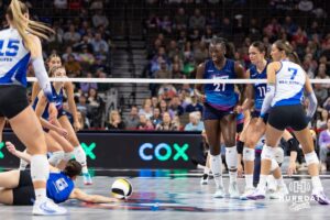 Omaha Supernovas Toyosi Onabanjo (21) watches Dallas Pulse Kylie Murr (6) get a pancake save after making a block during a professional volleyball match on Thursday, Feb. 12, 2026, in Omaha, Nebraska. Photo by John S. Peterson.