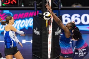 Omaha Supernovas Toyosi Onabanjo (21) blocks the ball against the Dallas Pulse during a professional volleyball match on Thursday, Feb. 12, 2026, in Omaha, Nebraska. Photo by John S. Peterson.