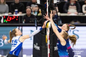 Omaha Supernovas Kiara Reinhardt (10) blocks the ball against Dallas Pulse Mimi Colyer (15) during a professional volleyball match on Thursday, Feb. 12, 2026, in Omaha, Nebraska. Photo by John S. Peterson.