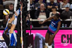 Omaha Supernovas Toyosi Onabanjo (21) spikes the ball agaisnt the Dallas Pulse during a professional volleyball match on Thursday, Feb. 12, 2026, in Omaha, Nebraska. Photo by John S. Peterson.