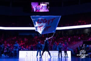 Omaha Supernovas Hype Squad waves the flag after leading the Novas out to take on the Dallas Pulse during a professional volleyball match on Thursday, Feb. 12, 2026, in Omaha, Nebraska. Photo by John S. Peterson.