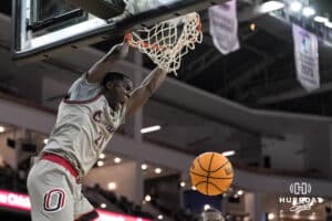 Omaha Maverick Valentino Simon (21) dunks during a college basketball game against St. Thomas on Feb 12, 2026, in Omaha, Nebraska. Photo by Brandon Tiedemann
