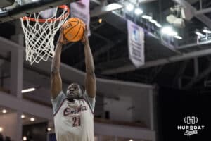 Omaha Maverick Valentino Simon (21) dunks during a college basketball game against St. Thomas on Feb 12, 2026, in Omaha, Nebraska. Photo by Brandon Tiedemann