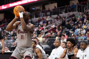 Omaha Maverick Paul Djobet (11) shoots a three pointer during a college basketball game against St. Thomas on Feb 12, 2026, in Omaha, Nebraska. Photo by Brandon Tiedemann