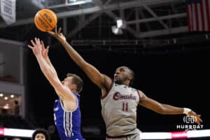 Omaha Maverick Paul Djobet (11) fights for a rebound during a college basketball game against St. Thomas on Feb 12, 2026, in Omaha, Nebraska. Photo by Brandon Tiedemann