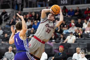Omaha Maverick Tony Osburn (32) gets fouled during a college basketball game against St. Thomas on Feb 12, 2026, in Omaha, Nebraska. Photo by Brandon Tiedemann