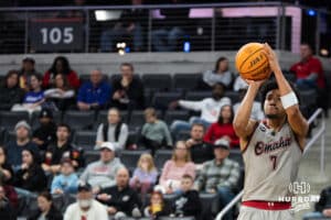 Omaha Maverick Lance Waddles (7) shoots a three pointer during a college basketball game against St. Thomas on Feb 12, 2026, in Omaha, Nebraska. Photo by Brandon Tiedemann