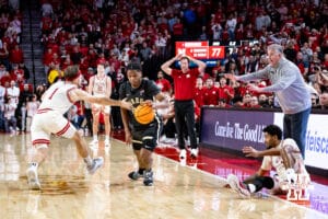 Nebraska Cornhusker guard Sam Hoiberg (1) reaches for the ball against Purdue Boilermaker guard Gicarri Harris (24) in the second half during a college basketball game on Tuesday, Feb. 10, 2026, in Lincoln, Nebraska. Photo by John S. Peterson.