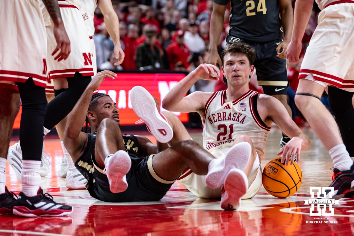 Nebraska Cornhusker forward Pryce Sandfort (21) gets the jump ball going after the ball against Purdue Boilermaker guard C.j.c.ox (0) during a college basketball game on Tuesday, Feb. 10, 2026, in Lincoln, Nebraska. Photo by John S. Peterson.