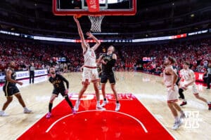 Nebraska Cornhusker forward Pryce Sandfort (21) makes a lay up against Purdue Boilermaker guard Fletcher Loyer (2) in the second half during a college basketball game on Tuesday, Feb. 10, 2026, in Lincoln, Nebraska. Photo by John S. Peterson.