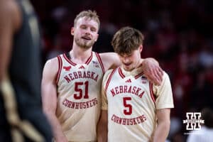 Nebraska Cornhusker forward Rienk Mast (51) talks to teammate Braden Frager in the second half against the Purdue Boilermakers during a college basketball game on Tuesday, Feb. 10, 2026, in Lincoln, Nebraska. Photo by John S. Peterson.