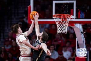 Nebraska Cornhusker forward Braden Frager (5) is blocked on a lay up by Purdue Boilermaker guard Aaron Fine (6) in the second half during a college basketball game on Tuesday, Feb. 10, 2026, in Lincoln, Nebraska. Photo by John S. Peterson.
