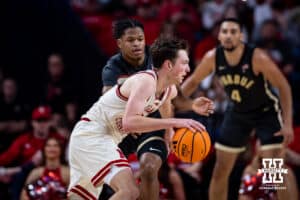 Nebraska Cornhusker forward Pryce Sandfort (21) drive the lane against the Purdue Boilermakers during a college basketball game on Tuesday, Feb. 10, 2026, in Lincoln, Nebraska. Photo by John S. Peterson.
