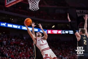 Nebraska Cornhusker guard Sam Hoiberg (1) makes a lay up against the Purdue Boilermakers during a college basketball game on Tuesday, Feb. 10, 2026, in Lincoln, Nebraska. Photo by John S. Peterson.
