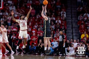 Purdue Boilermaker guard Omer Mayer (17) makes a three point basket against Nebraska Cornhusker guard Jamarques Lawrence (10) in the first half during a college basketball game on Tuesday, Feb. 10, 2026, in Lincoln, Nebraska. Photo by John S. Peterson.
