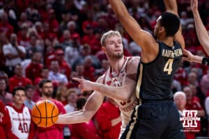 Nebraska Cornhusker forward Rienk Mast (51) passes the ball against Purdue Boilermaker forward Trey Kaufman-Renn (4) during a college basketball game on Tuesday, Feb. 10, 2026, in Lincoln, Nebraska. Photo by John S. Peterson.