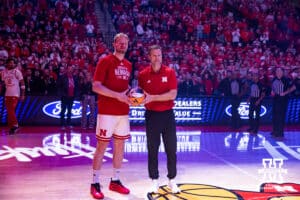 Nebraska Cornhusker head coach Fred Hoiberg presents Rienk Mast with a game ball for a 1000 rebounds before the game against the Purdue Boilermakers during a college basketball game on Tuesday, Feb. 10, 2026, in Lincoln, Nebraska. Photo by John S. Peterson.