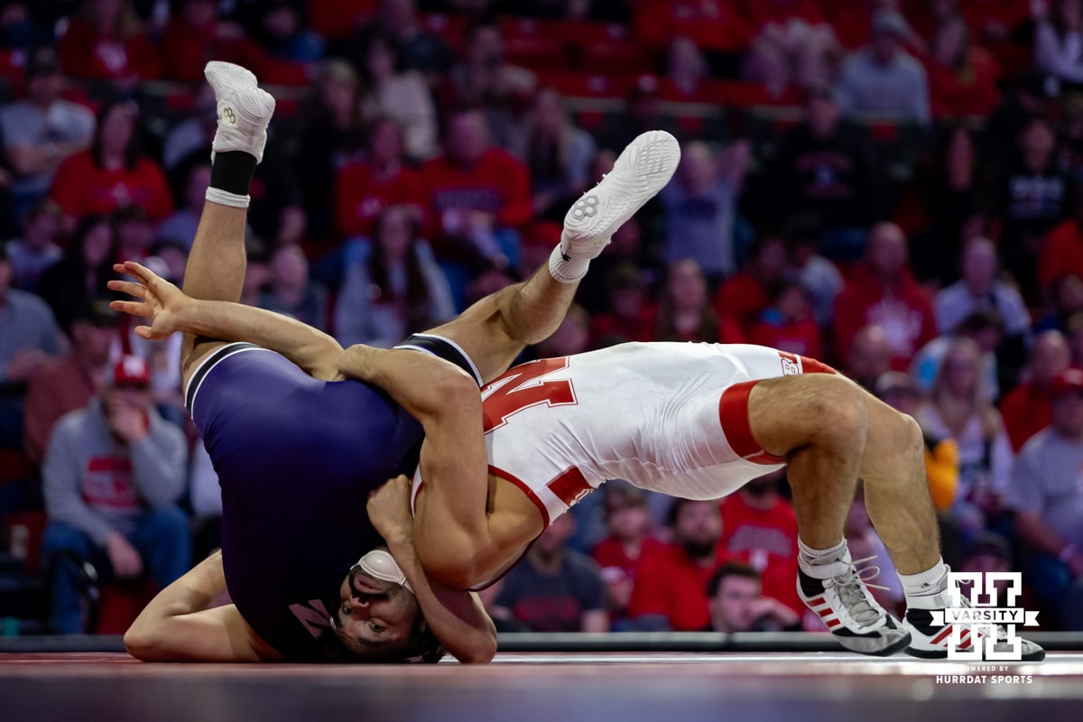 184: Nebraska Cornhusker Silas Allred tries to roll Northwestern Wildcat J.D. Perez over on his back during a college wrestling match on Sunday, Feb. 8, 2026, in Lincoln, Nebraska. Alred wins by technical fall 24-8. Photo by John S. Peterson.