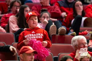 Nebraska Cornhusker fan watching the action against the Maryland Terrapins during a women’s basketball game on Saturday, Feb. 7, 2026, in Lincoln, Nebraska. Photo by John S. Peterson.