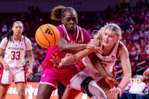 Nebraska Cornhusker forward Jessica Petrie (12) and Maryland Terrapin guard Saylor Poffenbarger (6) reach for the ball in the third quarter during a women’s basketball game on Saturday, Feb. 7, 2026, in Lincoln, Nebraska. Photo by John S. Peterson.