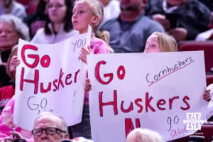 Nebraska Cornhusker fans holding up sign supporting their favorite team against Maryland Terrapins during a women’s basketball game on Saturday, Feb. 7, 2026, in Lincoln, Nebraska. Photo by John S. Peterson.