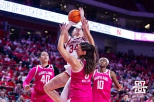Nebraska Cornhusker forward Emily Fisher (34) makes a lay up against Maryland Terrapin guard Rainey Welson (0) in the first quarter during a women’s basketball game on Saturday, Feb. 7, 2026, in Lincoln, Nebraska. Photo by John S. Peterson.