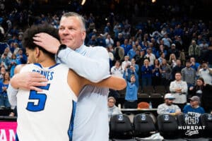 Creighton Bluejay head coach Greg McDermott hugs Nik Graves (5) after a college basketball game against Seton Hall on Feb 7, 2026, in Omaha, Nebraska. Photo by Brandon Tiedemann