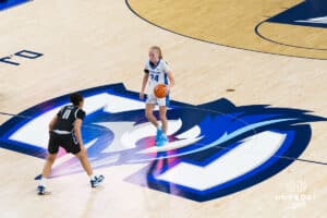Creighton Bluejay Ava Zediker (24) takes the ball up court during a college basketball game against Georgetown on Feb 4, 2026, in Omaha, Nebraska. Photo by Brandon Tiedemann
