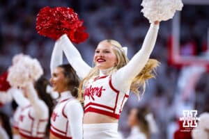 Nebraska Cornhuskers cheer squad member performing at a break in the action against the Illinois Fighting Illini during a college basketball game on Sunday, Feb. 1, 2026, in Lincoln, Nebraska. Photo by John S. Peterson.