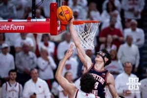 Illinois Fighting Illini center Zvonimir Ivisic (44) blocks a shot from Nebraska Cornhusker forward Berke Büyüktuncel (9) in the first halfl during a college basketball game on Sunday, Feb. 1, 2026, in Lincoln, Nebraska. Photo by John S. Peterson.
