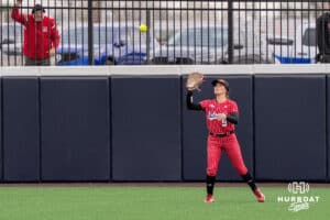 Nebraska Cornhusker Hannah Camenzind (9) catches a fly ball during a college softball game against Creighton on March 31, 2026, in Omaha, Nebraska. Photo by Brandon Tiedemann