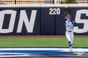 Creighton Bluejay Ella Dalton (13) catches a fly ball during a college softball game against Nebraska on March 31, 2026, in Omaha, Nebraska. Photo by Brandon Tiedemann