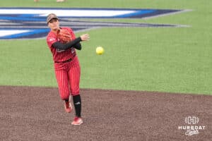 Nebraska Cornhusker Lauren Camenzind (2) throws to first base during a college softball game against Creighton on March 31, 2026, in Omaha, Nebraska. Photo by Brandon Tiedemann